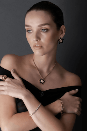 SUPERNOVA EARRINGS BLACK ENAMEL/CZ/GOLD